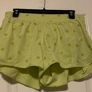 Lululemon Athletica Lime Hotty Hot Shorts Sz 12
4 inch, All over Logo, EUC